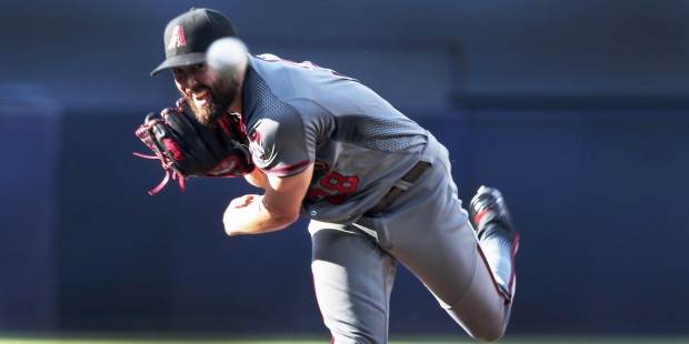 Arizona Diamondbacks starting pitcher Robbie Ray works against the San Diego Padres in the first in...