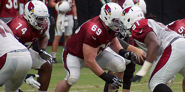D.J. Humphries and Evan Mathis make up a revamped Cardinals offensive line. (Adam Green/Arizona Spo...
