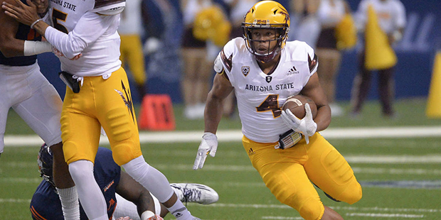 Arizona State running back Demario Richard (4) carries during the first half of an NCAA college foo...