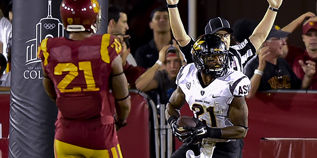 Southern California safety Su'a Cravens, left, looks on as Arizona State wide receiver Jaelen Stron...