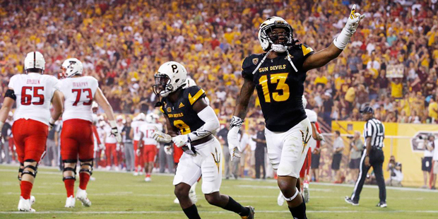 Arizona State's Armand Perry (13) and Maurice Chandler (8) celebrate a safety against Texas Tech as...