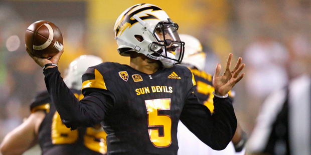 Arizona State's Manny Wilkins throws a pass against Texas Tech during the first half of an NCAA col...