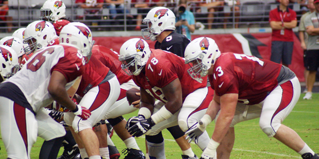 Linemen Earl Watford and John Wetzel prepare for the snap during the team's training camp practice ...