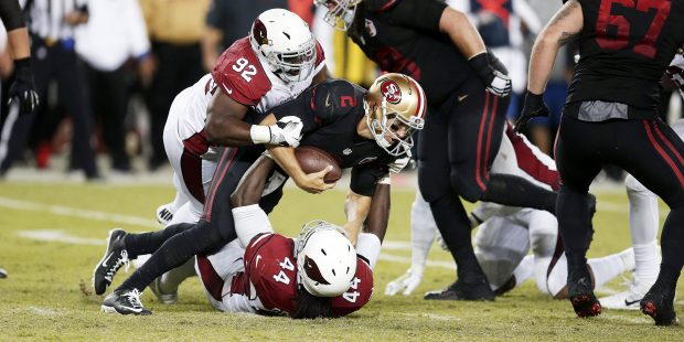 San Francisco 49ers quarterback Blaine Gabbert (2) is sacked by Arizona Cardinals outside linebacke...