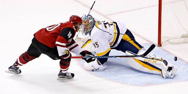 Arizona Coyotes left wing Anthony Duclair (10) scores against Nashville Predators goalie Pekka Rinn...