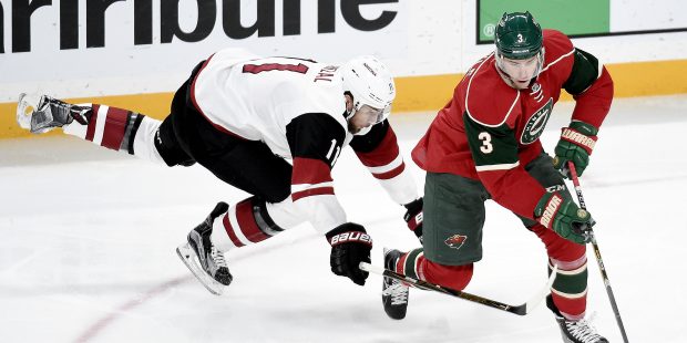 Minnesota Wild center Charlie Coyle (3) takes the puck against Arizona Coyotes center Martin Hanzal...