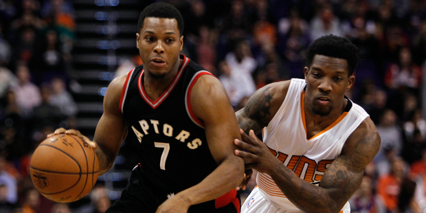 Toronto Raptors guard Kyle Lowry (7) drives past Phoenix Suns guard Eric Bledsoe during the first h...