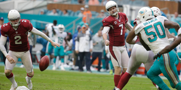 Arizona Cardinals kicker Chandler Catanzaro (7) watches as the ball bounces back after the extra po...