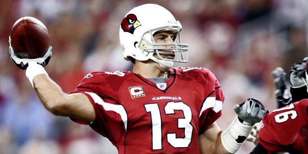 Arizona Cardinals quarterback Kurt Warner looks to throw against the San Francisco 49ers during the...