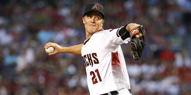 Arizona Diamondbacks starting pitcher Zack Greinke (21) throws against the Colorado Rockies during ...
