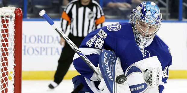 Tampa Bay Lightning goalie Andrei Vasilevskiy (88) makes a blocker save on a shot by the Carolina H...