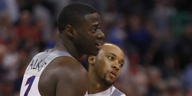 Arizona guard Rawle Alkins (1) and guard Parker Jackson-Cartwright (0) celebrate their win over Sai...