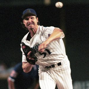 Arizona Diamondbacks' Randy Johnson delivers a pitch during the first inning against the Texas Rangers in Phoenix, Saturday, July 15, 2000. (AP Photo/Roy Dabner)