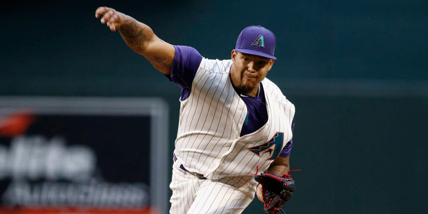 Arizona Diamondbacks' Taijuan Walker throws a pitch against the San Diego Padres during the first i...