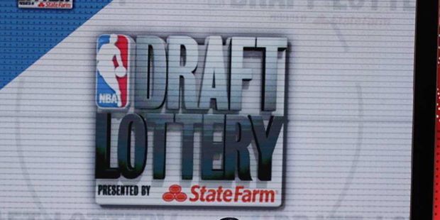 NBA deputy commissioner Mark Tatum announces the results for the Sacramento Kings at the NBA basket...
