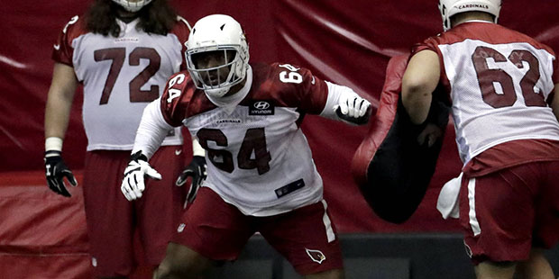 Arizona Cardinals fourth-round draft pick Dorian Johnson (64) works out during an NFL football rook...