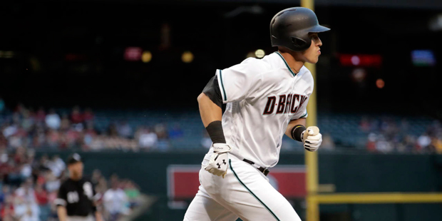 Arizona Diamondbacks' Jake Lamb (22) rounds the bases after hitting a two run home run during the f...