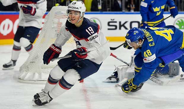 US forward Clayton Keller, left, just scored during the Ice Hockey World Championships group A matc...