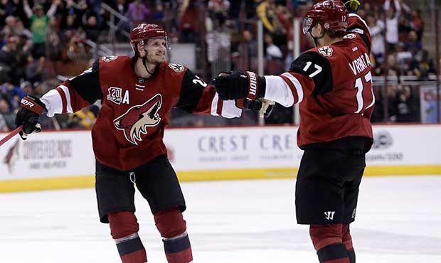 Arizona Coyotes right wing Radim Vrbata (17) celebrates with Oliver Ekman-Larsson after scoring a t...