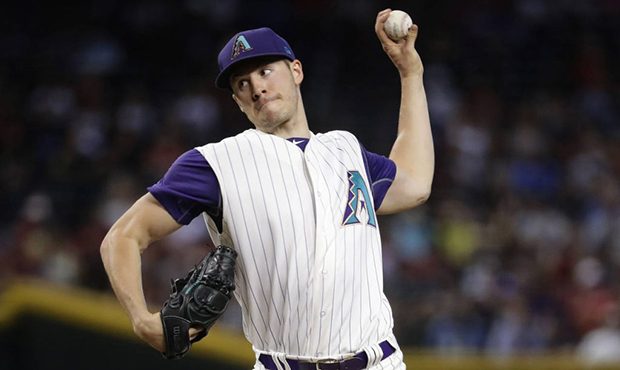 Arizona Diamondbacks starting pitcher Patrick Corbin throws against the St. Louis Cardinals during ...