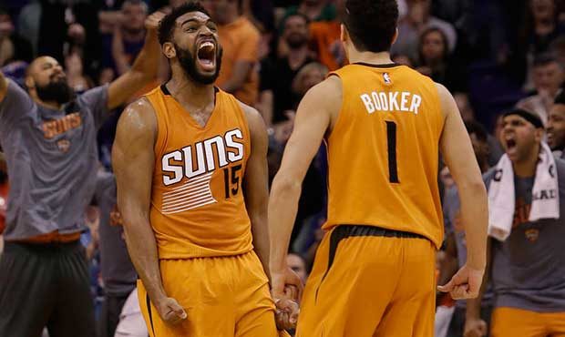 Phoenix Suns forward Alan Williams (15) celebrates with Devin Booker during an NBA basketball game ...