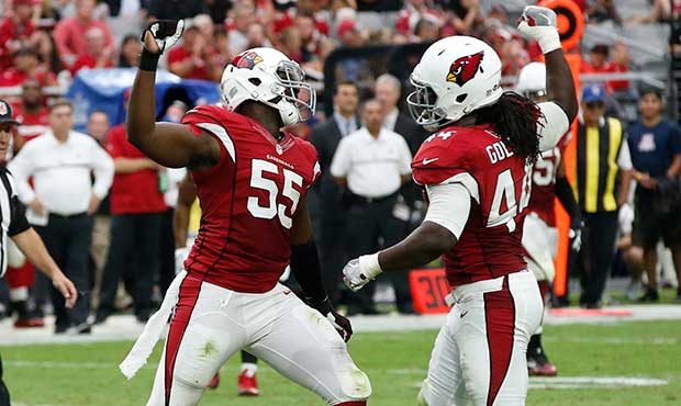 Arizona Cardinals outside linebacker Chandler Jones (55) and linebacker Markus Golden (44) celebrat...
