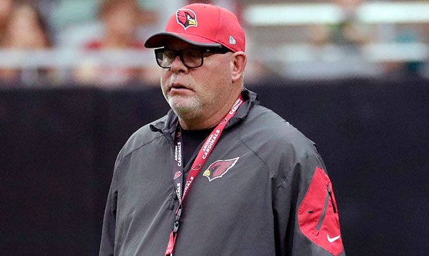 Arizona Cardinals coach Bruce Arians watches his team during the first day of the team's NFL footba...