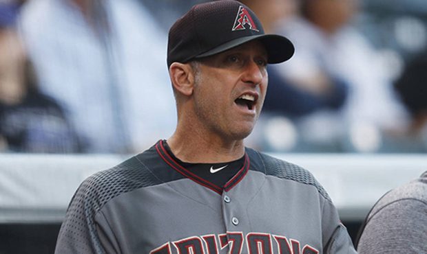 Arizona Diamondbacks manager Torey Lovullo directs his team against the Colorado Rockies in the fir...