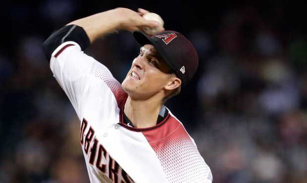 Arizona Diamondbacks starting pitcher Zack Greinke (21) throws against the Atlanta Braves during th...