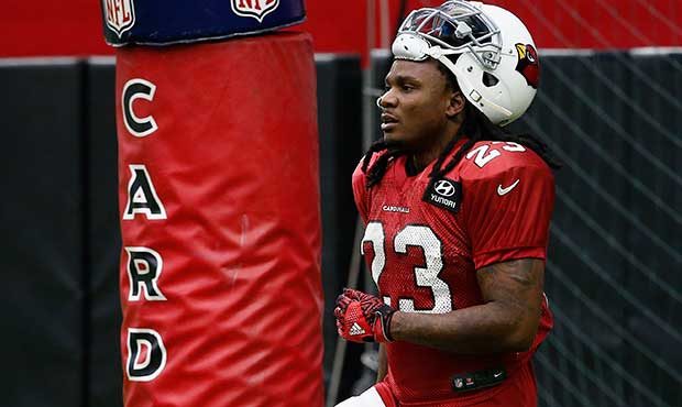 Arizona Cardinals' Chris Johnson warms up during an NFL football training camp Saturday, July 29, 2...
