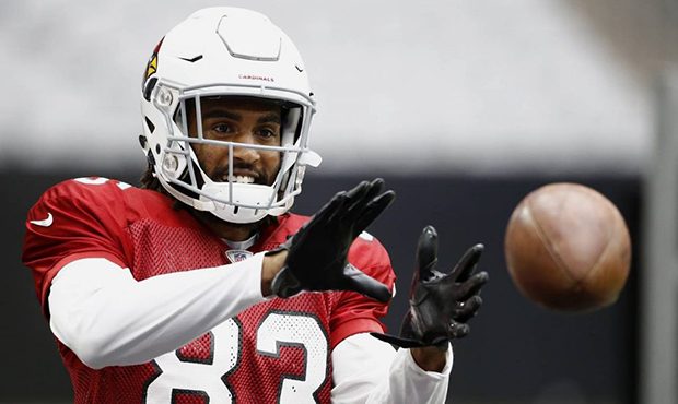 Arizona Cardinals wide receiver Aaron Dobson makes a catch during NFL football training camp Thursd...