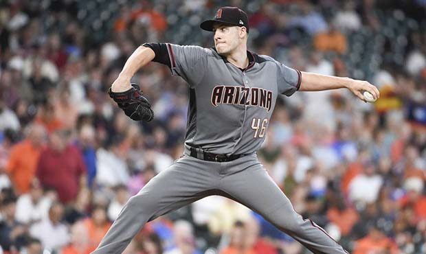 Arizona Diamondbacks starting pitcher Patrick Corbin delivers during the third inning of the team's...
