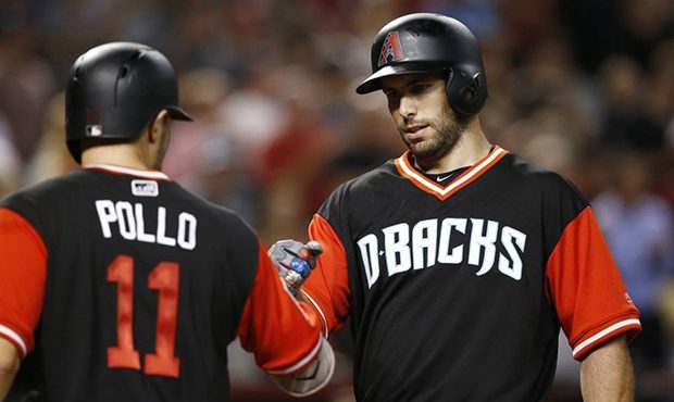 Arizona Diamondbacks' Paul Goldschmidt, right, celebrates his three-run home run against the San Fr...