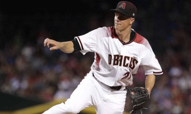 Arizona Diamondbacks starting pitcher Zack Greinke follows through on a delivery to the Los Angeles...