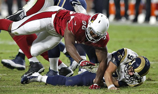 Arizona Cardinals defensive end Kareem Martin (96) sacks St. Louis Rams quarterback Austin Davis to...