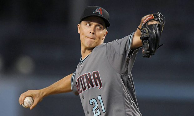Arizona Diamondbacks starting pitcher Zack Greinke winds up during the first inning of a baseball g...
