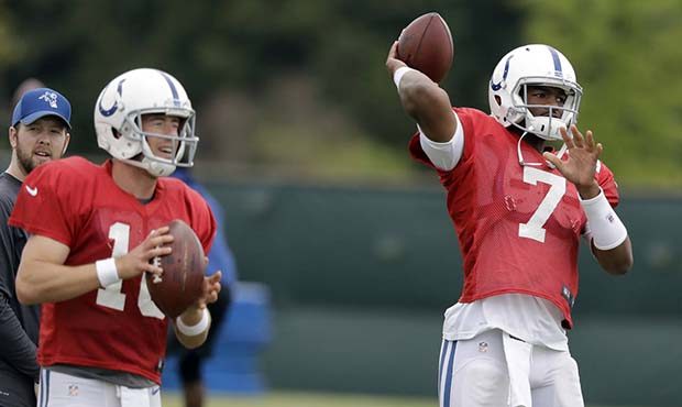 Indianapolis Colts quarterback Jacoby Brissett (7) and quarterback Scott Tolzien (16) throw during ...