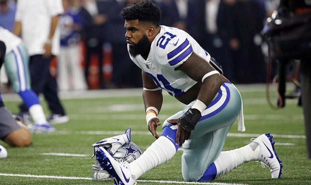 FILE - In this Sunday, Sept. 10, 2017, file photo, Dallas Cowboys running back Ezekiel Elliott warm...