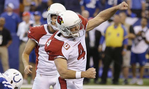 Arizona Cardinals' Phil Dawson celebrates after kicking a game-winning 30-yard field goal in overti...