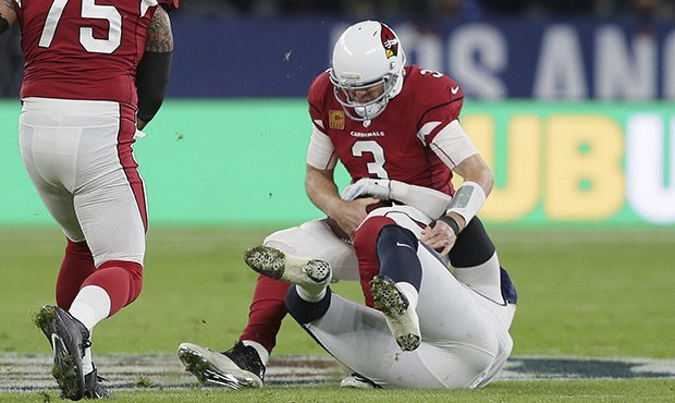 Arizona Cardinals quarterback Carson Palmer (3) is sacked during the first half of an NFL football ...