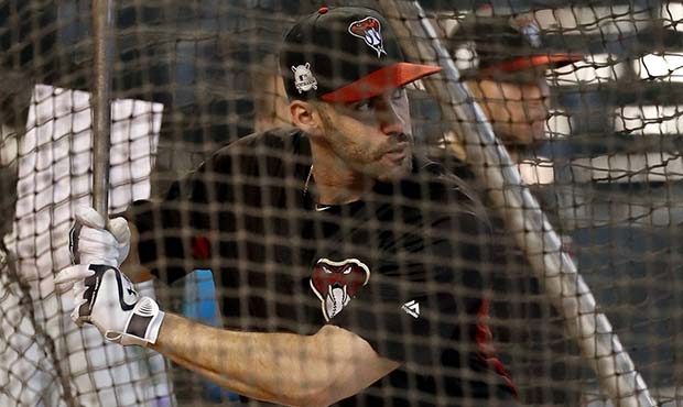 Arizona Diamondbacks right fielder J.D. Martinez hits during a workout at Chase Field, Tuesday, Oct...