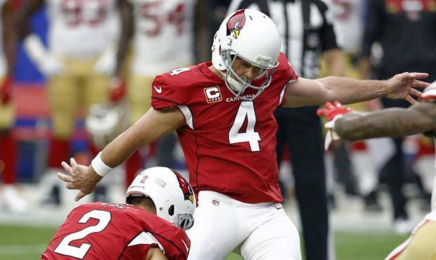 Arizona Cardinals kicker Phil Dawson (4) kicks a field goal against the San Francisco 49ers as punt...