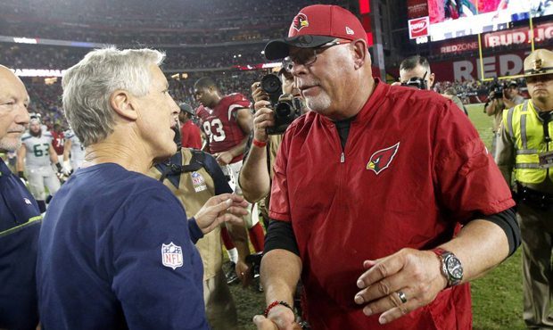 FILE - In this Oct. 23, 2016, file photo, Seattle Seahawks head coach Pete Carroll, left, greets Ar...