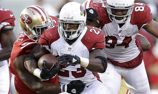 Arizona Cardinals running back Adrian Peterson (23) runs against San Francisco 49ers defensive end ...