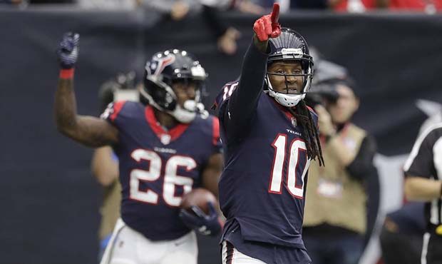 Houston Texans wide receiver DeAndre Hopkins (10) celebrates a touchdown catch by teammate Lamar Mi...