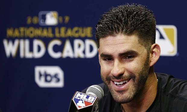Arizona Diamondbacks right fielder J.D. Martinez smiles a he answers a question during a news confe...
