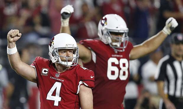Arizona Cardinals kicker Phil Dawson (4) celebrates his game winning 57-yard field goal during the ...