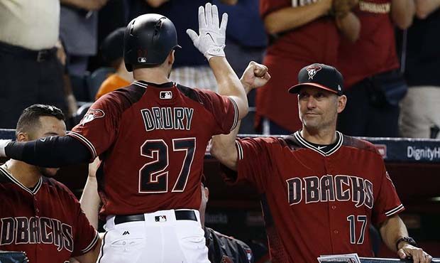 Arizona Diamondbacks' Brandon Drury (27) celebrates his home run against the Milwaukee Brewers with...