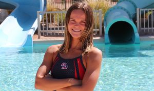 Red Mountain swimmer battles transverse myelitis while giving back
