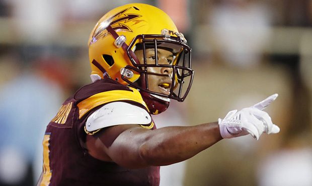 Arizona State's Demario Richard celebrates a first-half touchdown against Texas Tech during an NCAA...